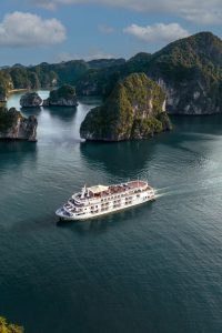 Scenic Ha Long Bay in Vietnam with limestone karsts, emerald waters, and cruise boats